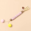 pink cat chew with ball tassles